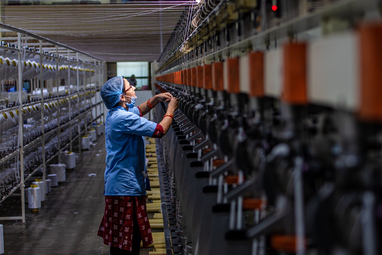 The winding section inside the Yoga Fabrics mill, yarn moving at scale